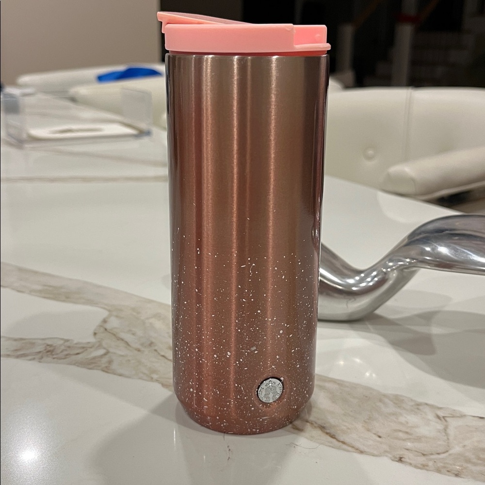EUC Starbucks insulated stainless steel lidded cup in metallic pink with “snow”